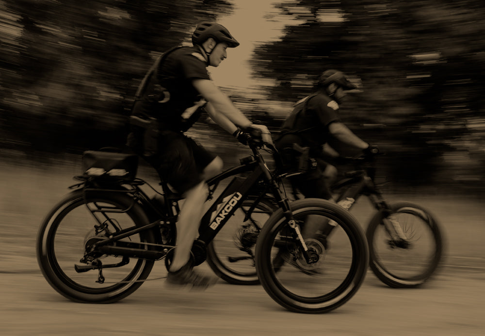 Two police officers riding Bakcou eBikes