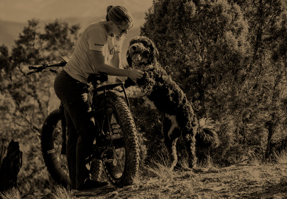Woman with Bakcou eBike and dog in nature