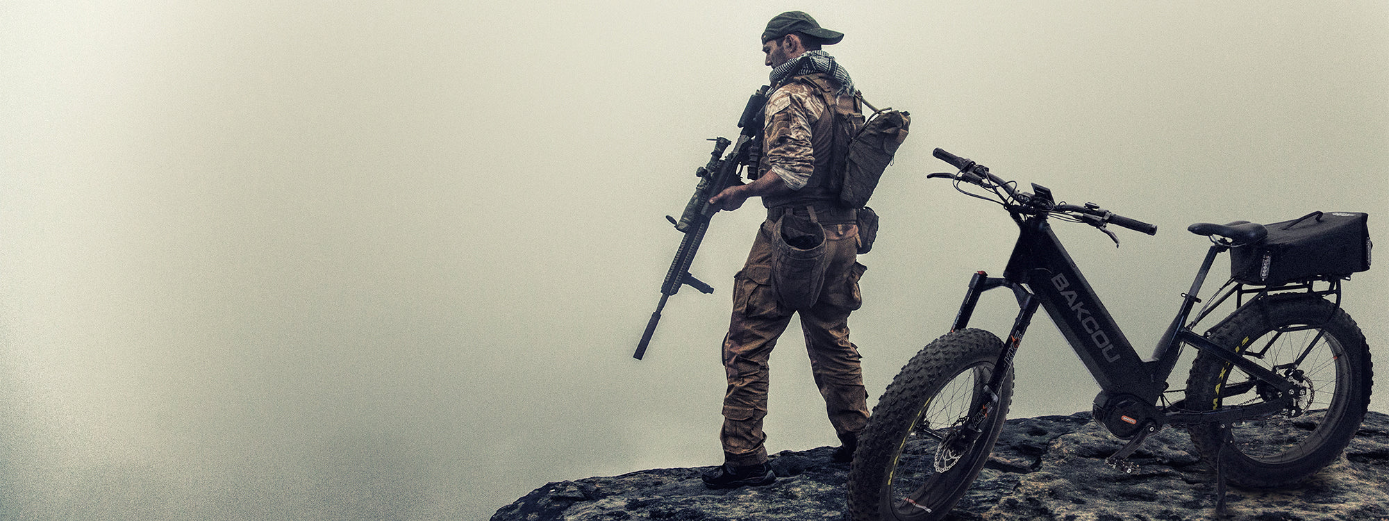 Military man on a cliff with the MAV3 eBike