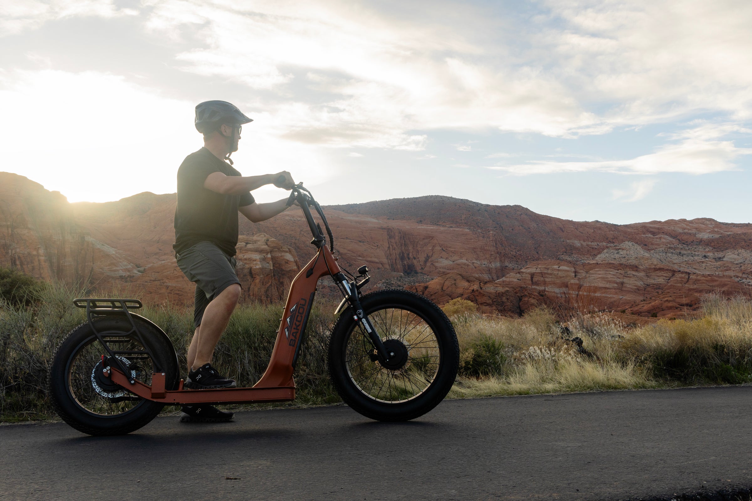 Man on Timberwolf AWD in red rock desert setting